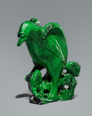 A CARVED MALACHITE FIGURE OF A BIRD OF PREY, QING DYNASTY