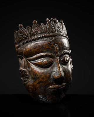 Lot 369 - A FINE COPPER REPOUSSÉ VOTIVE MASK OF A FEMALE DEITY, CENTRAL INDIA, 18TH-19TH CENTURY