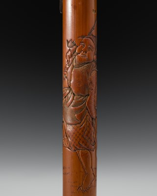 Lot 402 - HASEGAWA IKKO: A SUPERB AND LARGE BAMBOO KISERUZUTSU (PIPE CASE) DEPICTING EBISU WITH A FISH