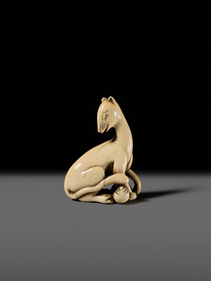 Lot 97 - A SUPERB AND RARE IVORY NETSUKE OF AN INARI FOX WITH TWO TAMA (SACRED JEWELS)