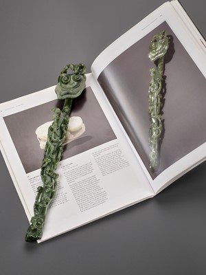 Lot 70 - A SPINACH-GREEN JADE RUYI SCEPTER, MID-QING