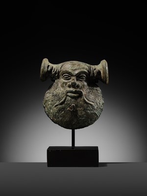 Lot 78 - A GREEK BRONZE MASK OF SILENUS, CIRCA EARLY 5TH CENTURY BC