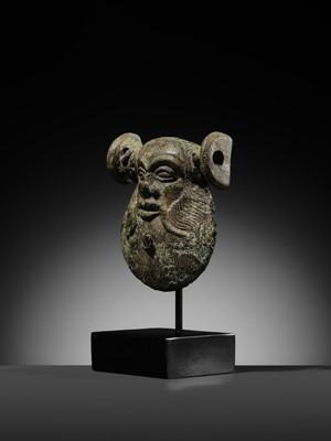 Lot 78 - A GREEK BRONZE MASK OF SILENUS, CIRCA EARLY 5TH CENTURY BC