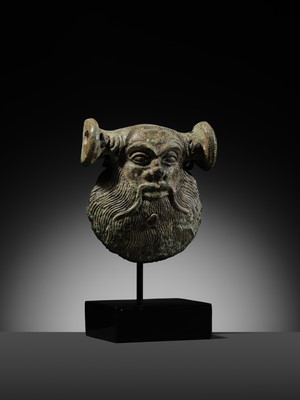 Lot 78 - A GREEK BRONZE MASK OF SILENUS, CIRCA EARLY 5TH CENTURY BC