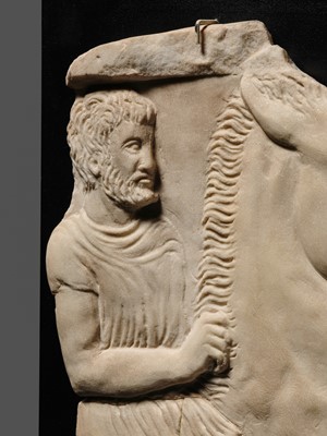 Lot 65 - A ROMAN WHITE MARBLE RELIEF FRAGMENT OF A SARCOPHAGUS DEPICTING A HORSEMAN AND STEED, CIRCA 2ND CENTURY AD