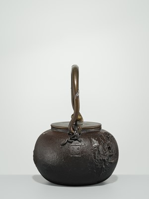 Lot 43 - RYUBUNDO: AN IRON TEA KETTLE (TETSUBIN) WITH A NOCTURNAL LANDSCAPE UNDER THE CRESCENT MOON