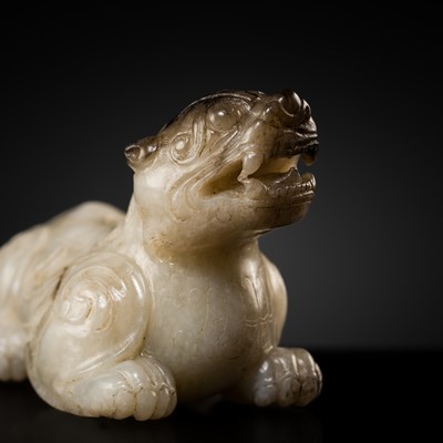 Lot 167 - A MOTTLED WHITE AND GREY JADE FIGURE OF A BIXIE, MING DYNASTY OR EARLIER