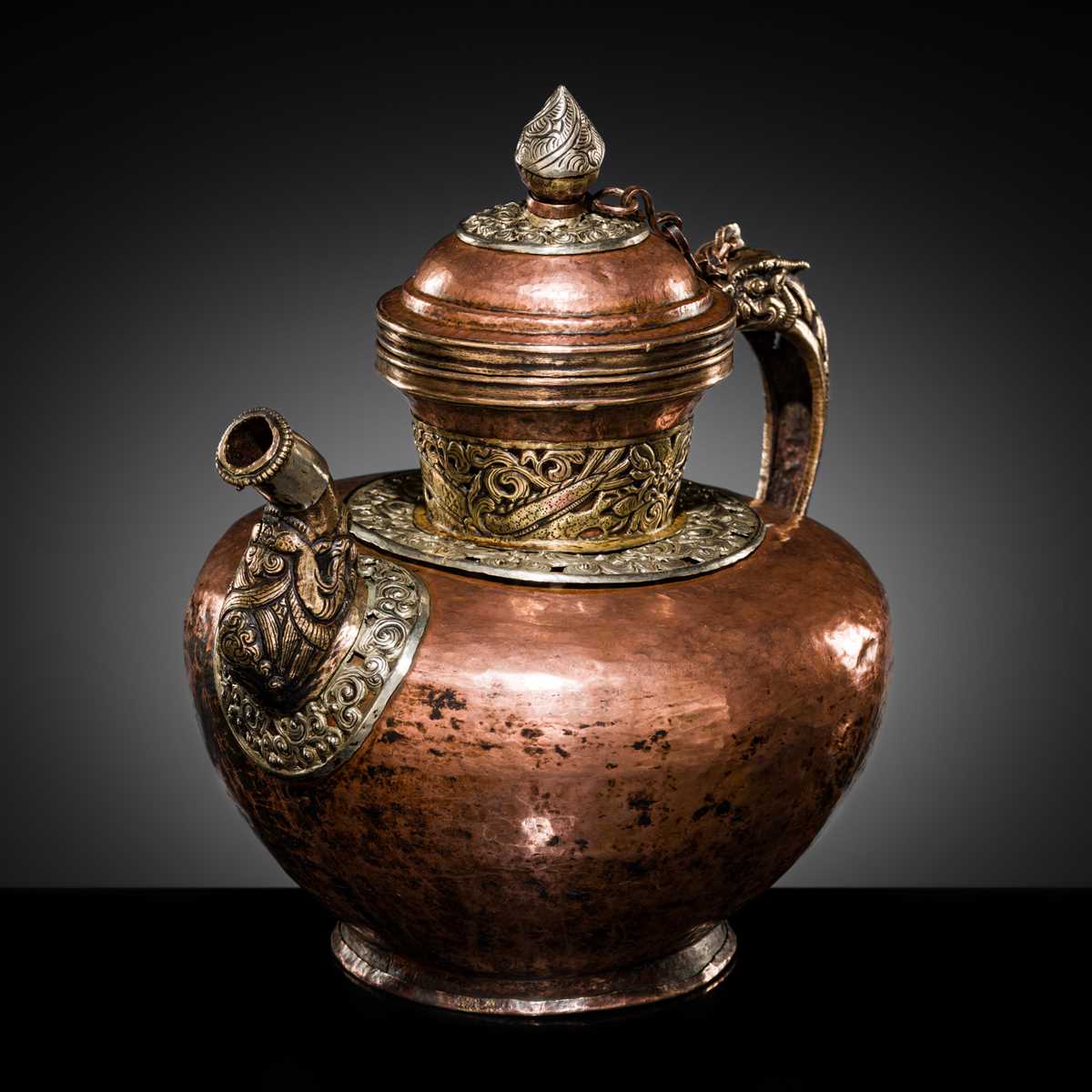 Lot 24 - A FINE SILVER AND BRASS APPLIED COPPER RITUAL