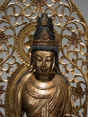 A LARGE GILT-LACQUERED WOOD FIGURE OF AMIDA NYORAI