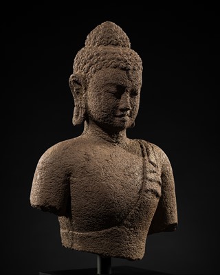 Lot 466 - AN ANDESITE BUST OF BUDDHA, CENTRAL JAVA, 9TH-10TH CENTURY