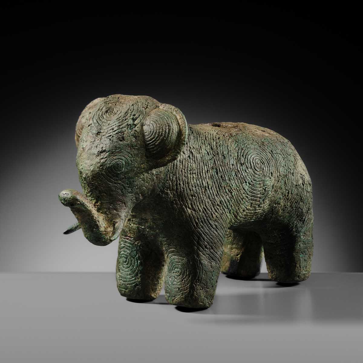Lot 123 - AN ELEPHANT-FORM BRONZE VESSEL, DONG SON CULTURE