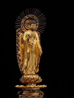 Lot 181 - A LARGE GILT WOOD FIGURE OF AMIDA NYORAI, BUDDHA OF INFINITE LIGHT, EDO PERIOD