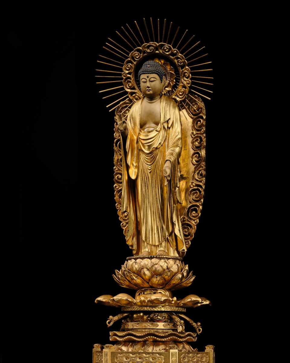 Lot 181 - A LARGE GILT WOOD FIGURE OF AMIDA NYORAI, BUDDHA OF INFINITE LIGHT, EDO PERIOD