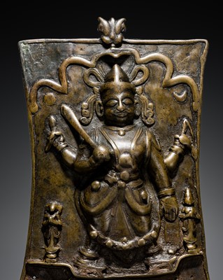Lot 356 - A BOLD CEREMONIAL BRONZE SHIELD DEPICTING VIRABHADRA, 17TH-18TH CENTURY