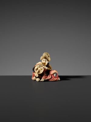 Lot 507 - KOGYOKU: A SMALL AND FINE ‘DARUMA AND COURTESAN’ TOKYO SCHOOL INLAID IVORY NETSUKE