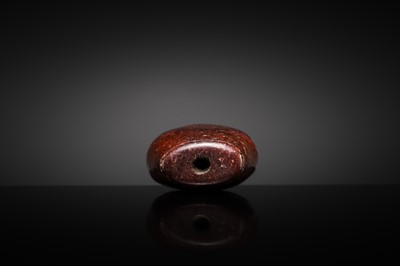 A RARE AND LARGE NEOLITHIC SERPENTINE ‘MASK’ BEAD, LIANGZHU CULTURE