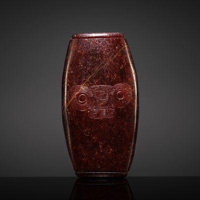 Lot 125 - A RARE AND LARGE NEOLITHIC SERPENTINE ‘MASK’ BEAD, LIANGZHU CULTURE