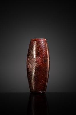 A RARE AND LARGE NEOLITHIC SERPENTINE ‘MASK’ BEAD, LIANGZHU CULTURE