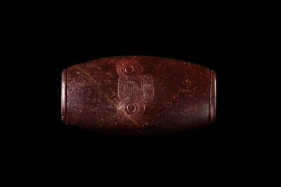 A RARE AND LARGE NEOLITHIC SERPENTINE ‘MASK’ BEAD, LIANGZHU CULTURE