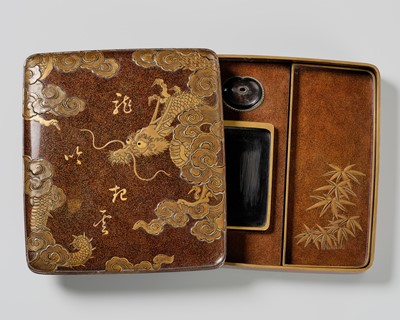 Lot 82 - A LACQUER SUZURIBAKO WITH DRAGON AND TIGER