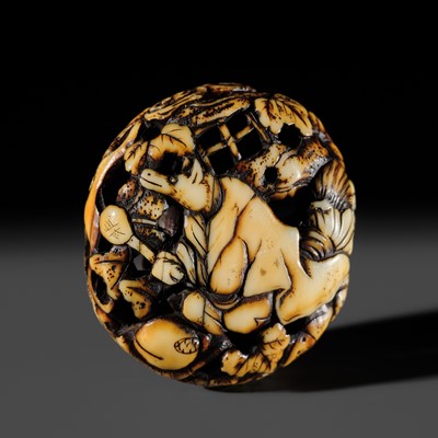 SANGETSU: A FINE WALRUS TUSK RYUSA MANJU NETSUKE OF A TANUKI PRIEST