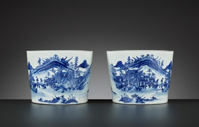 Lot 267 - A PAIR OF BLUE AND WHITE ‘LANDSCAPE’ JARDINIERES, QING DYNASTY