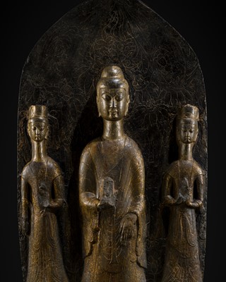 Lot 110 - A VERY LARGE AND IMPORTANT LIMESTONE ‘LONG-NECK’ STELE OF SHAKYAMUNI, AVALOKITESHVARA, AND MAHASTHAMAPRAPTA, NORTHERN WEI DYNASTY (386-534)