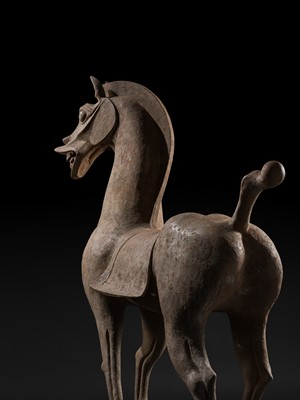 Lot 140 - A MONUMENTAL AND HIGHLY IMPORTANT SICHUAN POTTERY HORSE, HAN DYNASTY, THE LARGEST EVER RECORDED FROM THIS GROUP