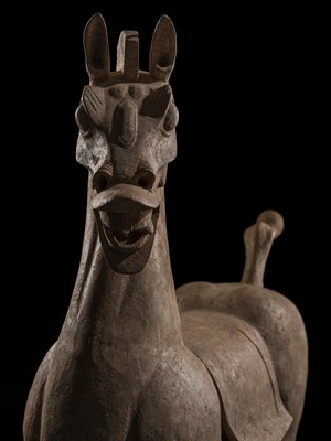 Lot 140 - A MONUMENTAL AND HIGHLY IMPORTANT SICHUAN POTTERY HORSE, HAN DYNASTY, THE LARGEST EVER RECORDED FROM THIS GROUP