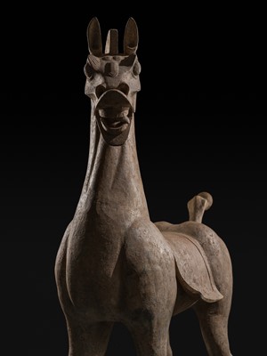 Lot 140 - A MONUMENTAL AND HIGHLY IMPORTANT SICHUAN POTTERY HORSE, HAN DYNASTY, THE LARGEST EVER RECORDED FROM THIS GROUP