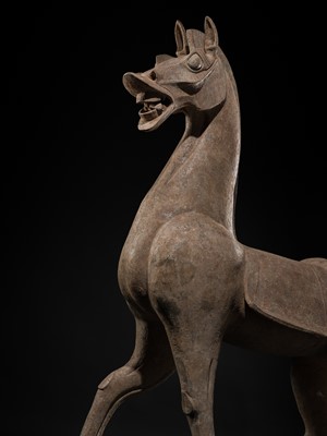 Lot 140 - A MONUMENTAL AND HIGHLY IMPORTANT SICHUAN POTTERY HORSE, HAN DYNASTY, THE LARGEST EVER RECORDED FROM THIS GROUP