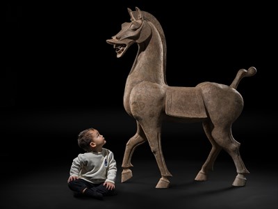 Lot 140 - A MONUMENTAL AND HIGHLY IMPORTANT SICHUAN POTTERY HORSE, HAN DYNASTY, THE LARGEST EVER RECORDED FROM THIS GROUP