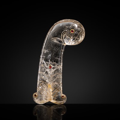 Lot 377 - A GILT AND GEM-INLAID MUGHAL ROCK CRYSTAL DAGGER HILT