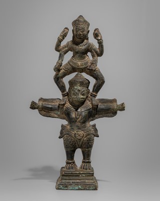 A BRONZE FIGURE OF VISHNU AND GARUDA, ANGKOR WAT STYLE