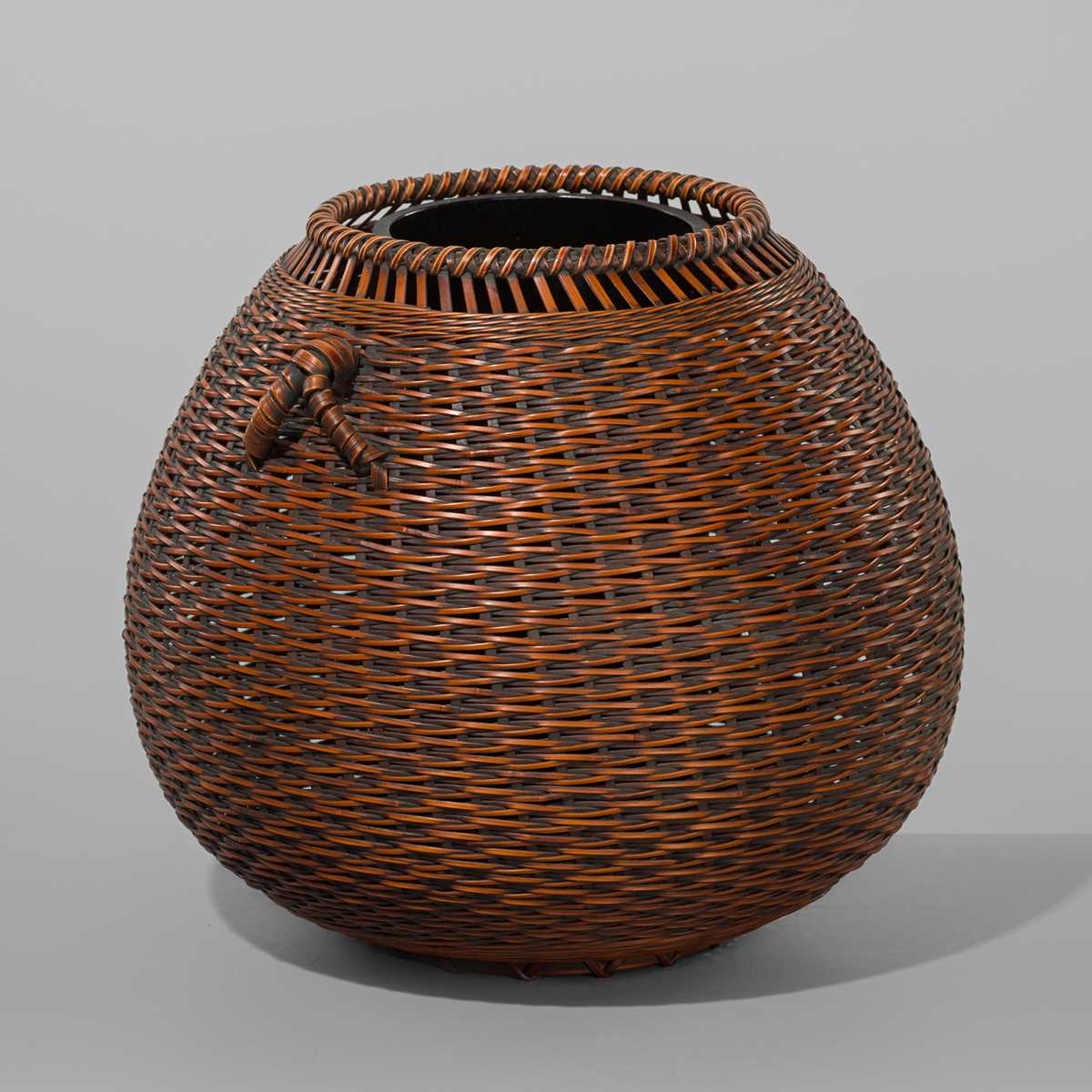 Lot 1557 - OKAZAKI CHIKUHOSAI II: A BAMBOO AND RATTAN HANAKAGO (FLOWER BASKET)