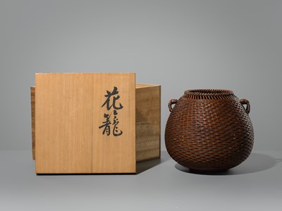 Lot 1557 - OKAZAKI CHIKUHOSAI II: A BAMBOO AND RATTAN HANAKAGO (FLOWER BASKET)