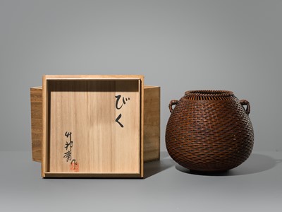 Lot 1557 - OKAZAKI CHIKUHOSAI II: A BAMBOO AND RATTAN HANAKAGO (FLOWER BASKET)