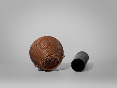 Lot 1557 - OKAZAKI CHIKUHOSAI II: A BAMBOO AND RATTAN HANAKAGO (FLOWER BASKET)