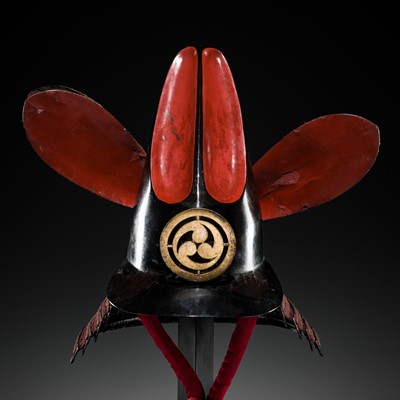 Lot 96 - A RARE LACQUERED IRON ‘RABBIT EARS’ KAWARI KABUTO (ECCENTRICALLY SHAPED HELMET)