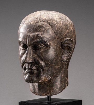 Lot 615 - A ROMAN LIMESTONE PORTRAIT HEAD OF JULIUS CAESAR, AUGUSTAN PERIOD