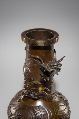 Lot 1541 - SHUHO: A PARCEL-GILT BRONZE VASE WITH A DRAGON