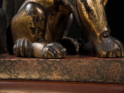 Lot 102 - AN IMPRESSIVE PAIR OF LARGE POLYCHROME AND GILT-LACQUERED WOOD KOMAINU (KOREAN GUARDIAN DOGS), KAMAKURA TO NANBOKUCHO PERIOD