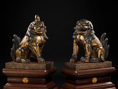 Lot 102 - AN IMPRESSIVE PAIR OF LARGE POLYCHROME AND GILT-LACQUERED WOOD KOMAINU (KOREAN GUARDIAN DOGS), KAMAKURA TO NANBOKUCHO PERIOD