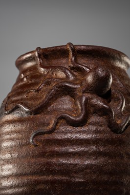 Lot 21 - AN IRON VASE IN THE FORM OF A TAKOTSUBO (OCTOPUS POT)