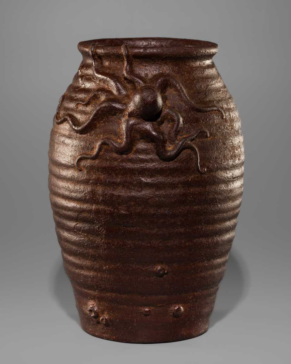 Lot 21 - AN IRON VASE IN THE FORM OF A TAKOTSUBO (OCTOPUS POT)