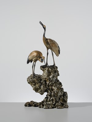 Lot 9 - MASAMITSU: AN IMPRESSIVE SILVER-PATINATED BRONZE OKIMONO OF TWO CRANES ON A ROCK