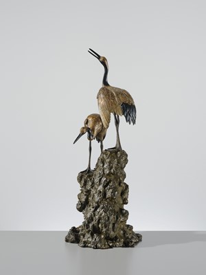 Lot 9 - MASAMITSU: AN IMPRESSIVE SILVER-PATINATED BRONZE OKIMONO OF TWO CRANES ON A ROCK