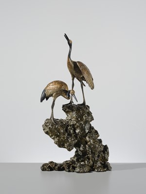 Lot 9 - MASAMITSU: AN IMPRESSIVE SILVER-PATINATED BRONZE OKIMONO OF TWO CRANES ON A ROCK