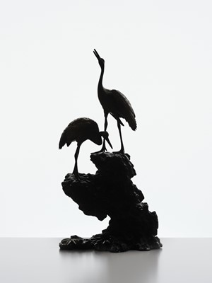 Lot 9 - MASAMITSU: AN IMPRESSIVE SILVER-PATINATED BRONZE OKIMONO OF TWO CRANES ON A ROCK