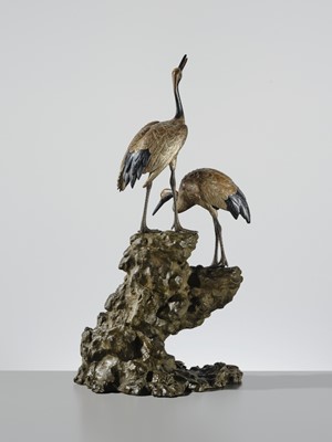 Lot 9 - MASAMITSU: AN IMPRESSIVE SILVER-PATINATED BRONZE OKIMONO OF TWO CRANES ON A ROCK